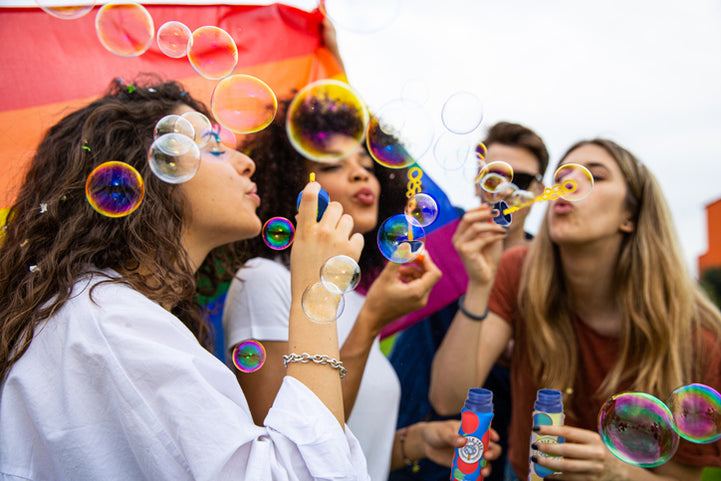 People blowing non-toxic eco-friendly bubbles
